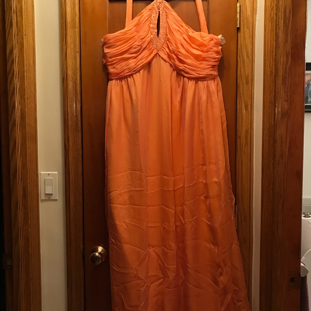 Elegant silk evening gown in iridescent orange silk and detailed sequined bodice